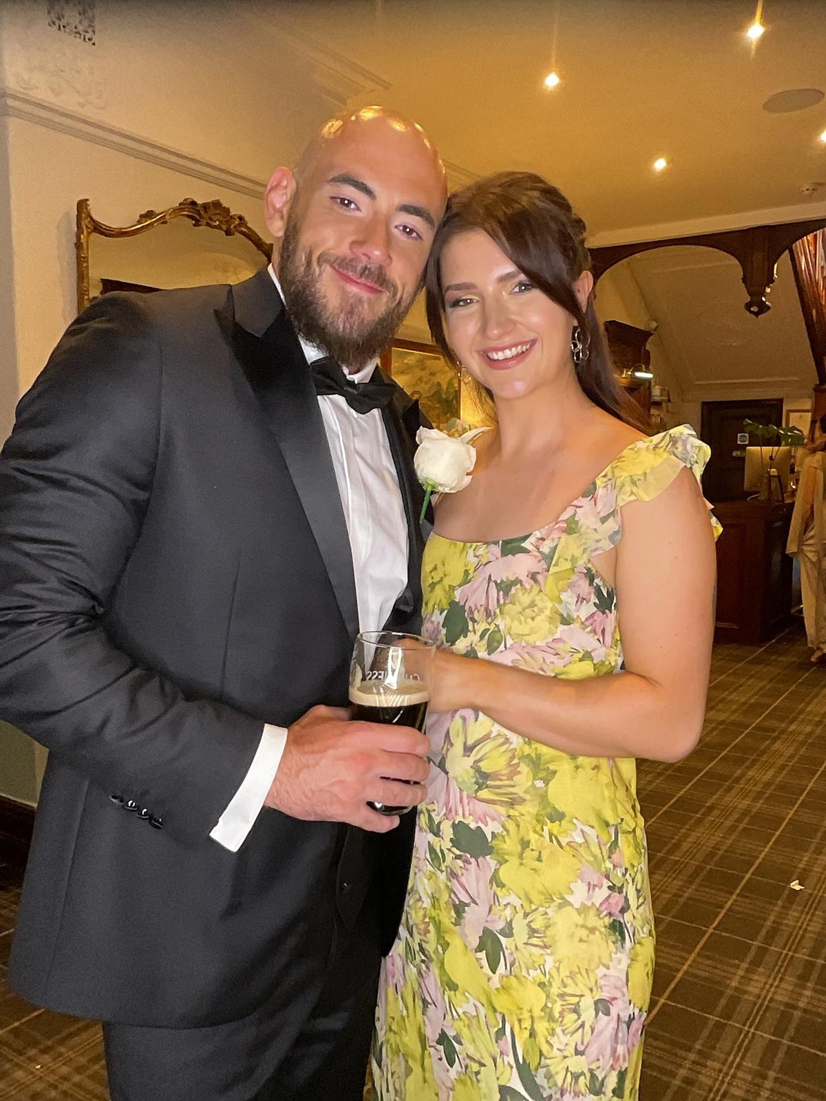 Robyn Anderton in a floral dress at a black tie event